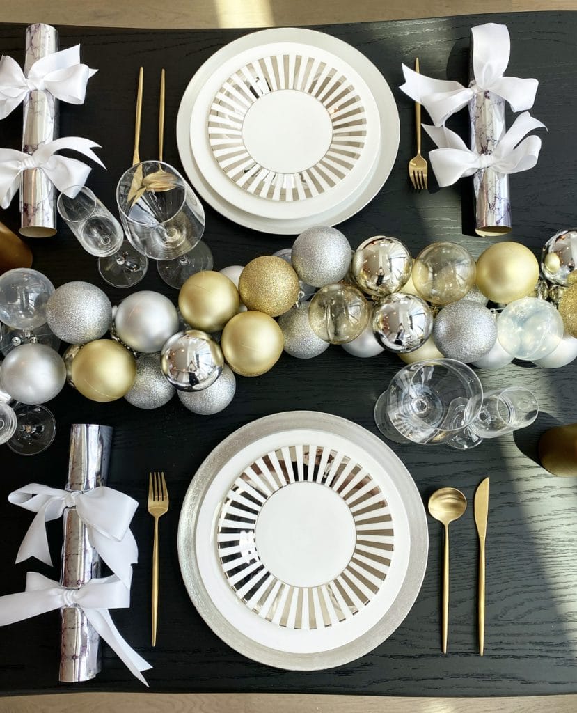 Christmas styling table setting with a gold and silver theme